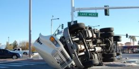 Case Study: Car Hit by Tractor Trailer and Caught Fire, but Insurance Denied Responsibility Photo